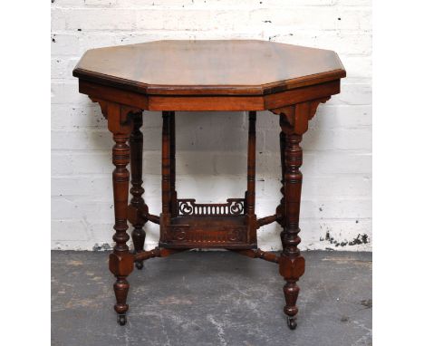 Edwardian walnut window table, octagonal top with a moulded edge, turned and ringed legs, joined by a shelf, width 76cm, heig