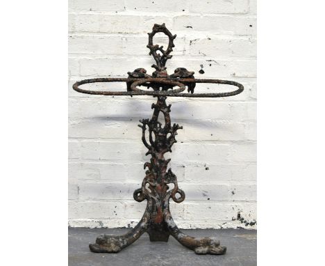 Victorian cast iron stick stand, with rope cast retainer, splayed legs, width 58cm, height 80cm.