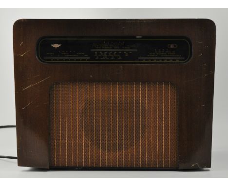 Kolster-Brandes walnut cased mains radio, model ER10, 250v, length 50cm with instruction book and a medicorl cabinet battery.