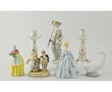 Pair of Dresden porcelain candlesticks, floral encrusted, tripod bases, height 17cm, Dresden china group, The Bird Cage, Crow