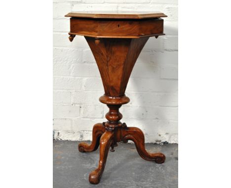 Victorian walnut trumpet work table, octagonal form, hinged lid with a moulded edge, enclosing compartments, (a.f.), tapering