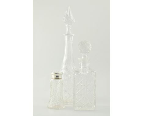 Orrefors glass decanter and stopper, decorated with a hunting scene, the stopper decorated with horses head, signed, height 2
