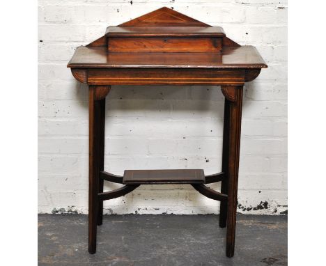 Victorian rosewood side table, architectural back with a drawer, rectangular top with inlaid spandrels, square tapering legs 