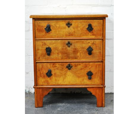 Small walnut chest of drawers, 18th Century style, rectangular top with broad crossbanding, moulded edge, three drawers, brac