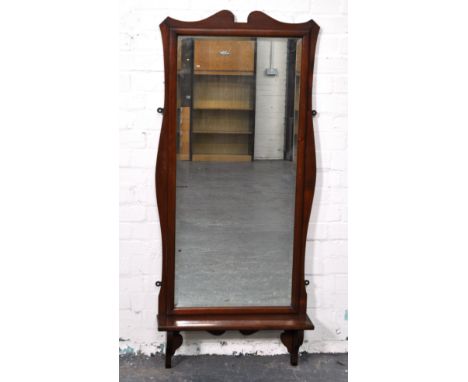 Edwardian mahogany hall mirror, shaped frame with a shelf under, rectangular bevelled plate, width 65cm, height 145cm.