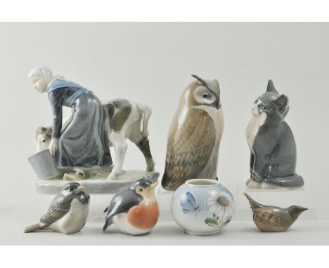 A Copenhagen model of a milkmaid, height 16cm, other Copenhagen and other models including owls.