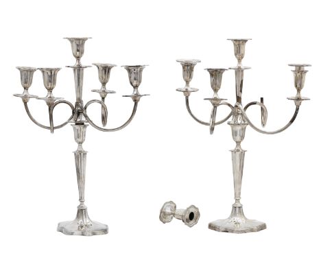 A pair of  five-light silver candelabraMappin &amp; Webb, Sheffield, 1958 in the George III style, each with shaped oval base