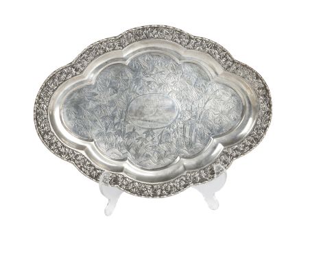 A Chinese export silver traystamped LGOf shaped and molded oval from and with engraved dedication to H S Wilkinson from the S