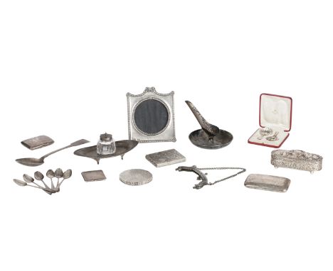 A collection of silver small itemsincluding: an Exeter gravy spoon, a photo frame, three cigarette boxes, an inkwell, a Conti