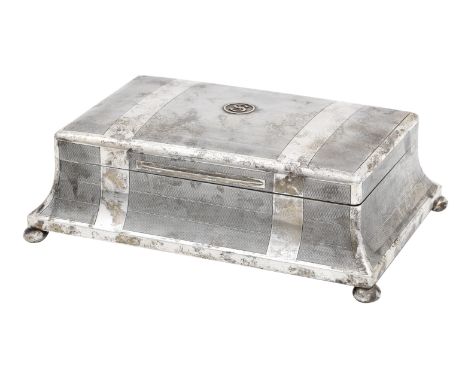 A silver-mounted table cigar boxmaker's mark unclear, London, 1922  of tapering form with banded engine turned decoration and