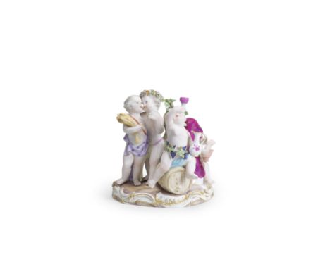 A small Meissen group of putti emblematic of the Four Seasons, 19th centuryWinter seated on rockwork, wearing a cloak and hol