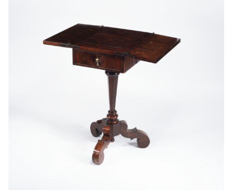 A William and Mary Kingwood Games-TableThe rectangular hinged top on a ratcheted support, above a frieze drawer containing a 