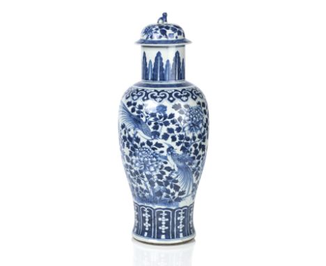 A blue and white baluster vase and coverLate 19th centuryPainted with birds perched on flowering branches and with ruyi band 