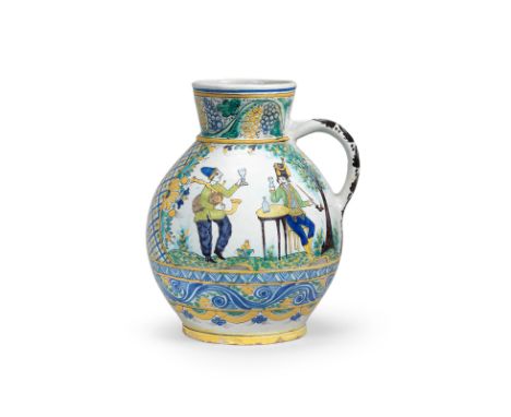 A Slovakian faience jug, late 19th/early 20th centuryPainted by Ferdiš Kostka in Haban style with a figure seated at an inn t