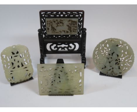 A miniature jade and hardwood table screenlate Qing/Republicthe jade panel carved with a Kylin, in a pierced stand, 12cms hig