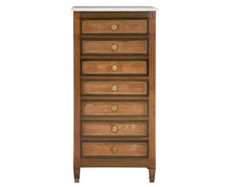 A late 19th/early 20th Century French gilt metal mounted mahogany and walnut chestThe rectangular marble top with moulded edg