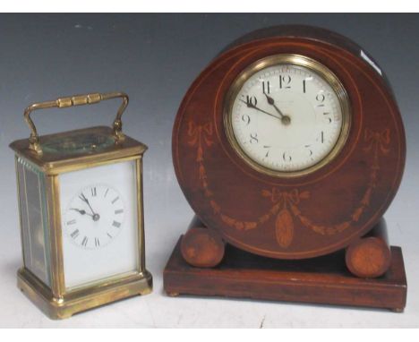 John Elkan Liverpool City overmantel clock in circular sheraton revival case decorated with husk trails, 23 x 19cm; together 