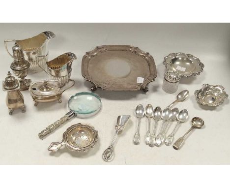 A collection of silverware including waiter, cruets, cream jugs, flatware etc., 983g (31ozt) weighable silver, together with 