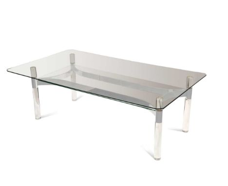 A glass and chrome coffee table, 20th century, the rectangular top on four perspex column supports united by a chrome frame w