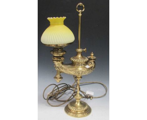 An adjustable brass lamp with lemon yellow opaline shade, untested 54cm high.