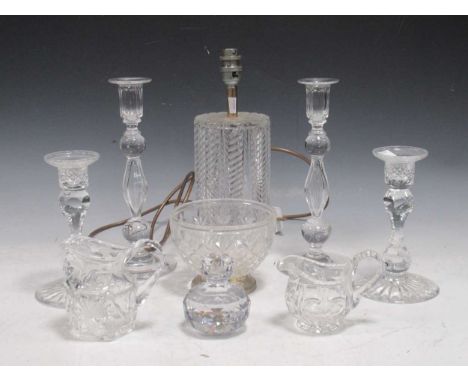 A pair of cut glass crystal candlesticks, with knopped stems, 27cms high, another pair smaller; together with set of eight mo