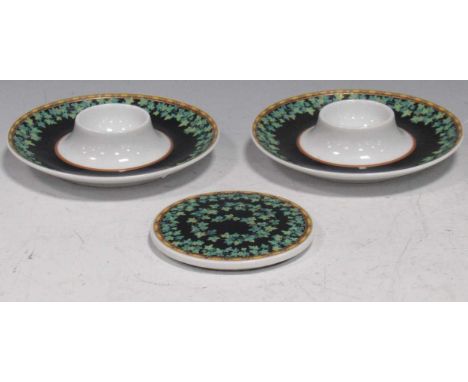 Pair of Rosenthal Versace 'Gold Ivy' pattern egg cups, 14cm diameter, together with a coaster (3)