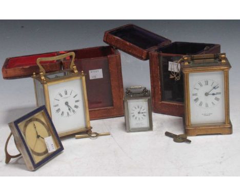 A brass carriage clock by 'Allen &amp; Daws Norwich' with leather travel case and winding key together with; another brass ca