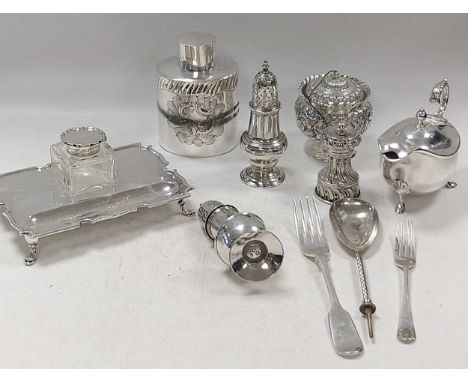A collection of silverware including ink stand, cruets, sauce boat, tea caddy, 947g (30ozt) gross weighable silver along with
