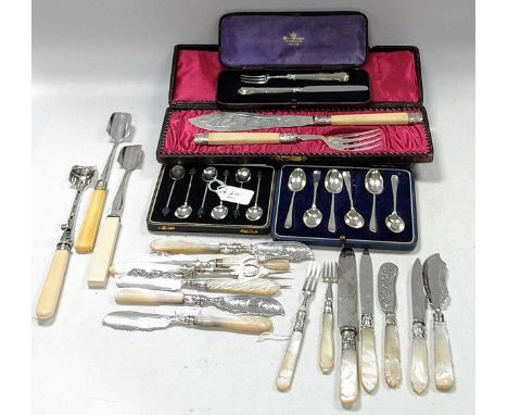 A collection of mother of pearl mounted flatware, mainly silver, together with a plated fork and knife, a cased silver fork a