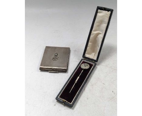 A silver compact, together with a silver stick pin