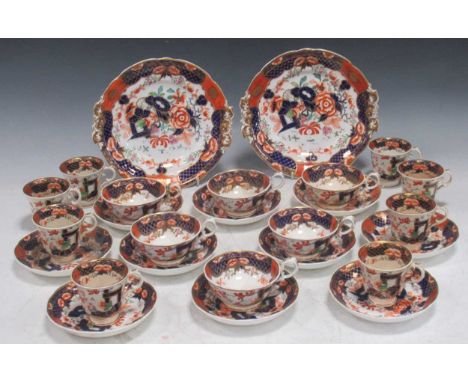 English 19th century imari pattern part tea service with eight coffee, seven teacups, ten saucers and two serving dishes (qty
