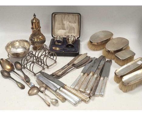 A collection of silverware including toast racks, sugar caster, flatware, christening set etc, 998g (32ozt) weighable silver,