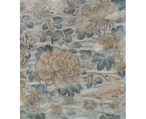 Three framed textiles to include: an early 20th century Asian silk textile, the celadon silk ground embroidered with chrysant