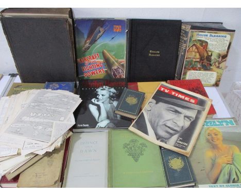 A collection of assorted books including a signed copy of "Defence until Dawn", "Aircraft of the Fighting Powers", "Marilyn M