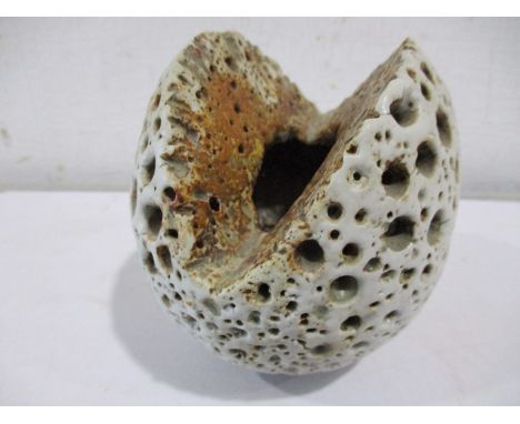 An Alan Wallwork (1931-2019) split seed pod vase with pierced decoration, 11cm height