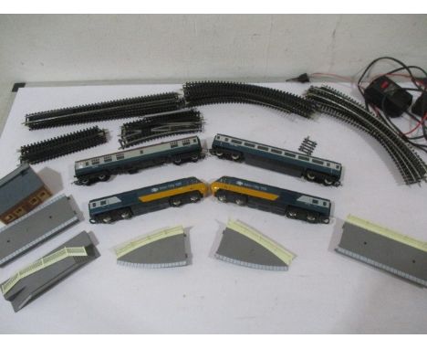 A collection of Hornby model railway including two Inter-City 125 locomotives, two carriages, platform, track etc