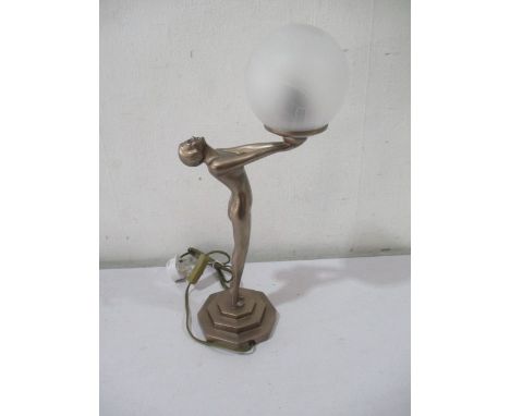 An art deco style lamp, the stem formed as a nude lady