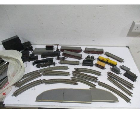 A collection of Tri-Ang model railway including locomotives, carriages, rolling stock, track etc - some pieces A/F