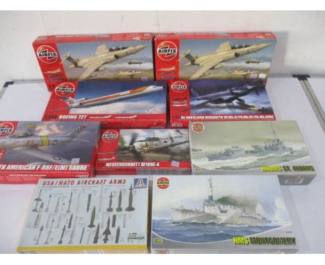 A collection of boxed Airfix planes and warships model kits (scale 1:72) including a Hawker Siddeley Buccaneer, North America