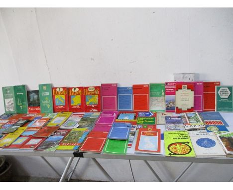 A collection of ordnance survey maps with assorted road maps, travel guides including Michelin etc covering Europe and UK. 