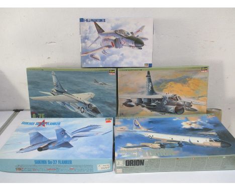 A collection of five boxed Hasegawa model planes including: F-4EJ Phantom II, L.T.V. A-7E Corsair II "Vallions", Lockheed P-3