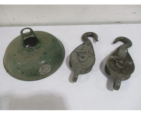 A vintage Coolicon industrial style lamp shade along with two 5 1/2 inch pulleys