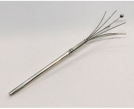 A hallmarked silver swizzle stick A/F