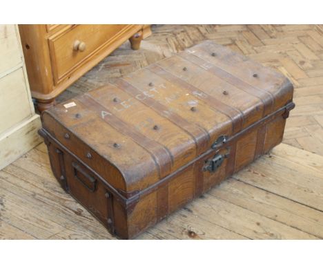 A metal travelling trunk