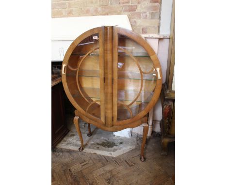 A good quality Art Deco walnut display cabinet by Spranglett, London