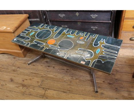 A mid Century tile top coffee table on chrome base