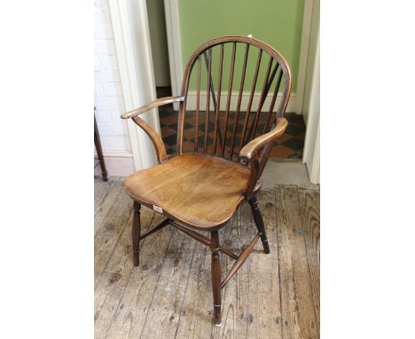 A late 19th Century yew and elm stick back armchair