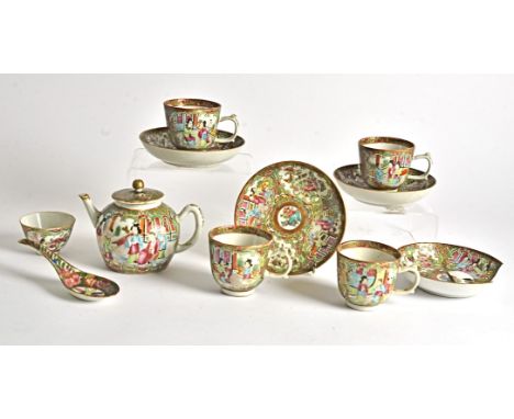 A 20th Century Chinese polychrome Canton enamel decorated part tea set,  with figures in attendance, butterflies and birds, h