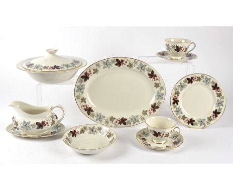 A Royal Doulton 'Camelot' pattern part dinner and tea service, consisting of 12 large plates, 11 medium plates, 12 bowls, 12 