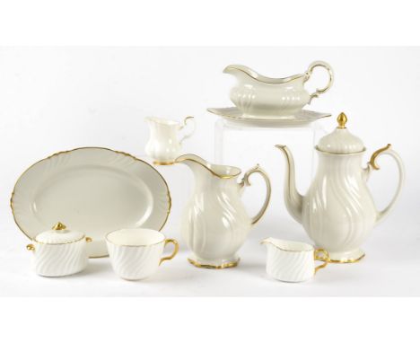 A Minton part tea set,  including a teapot, coffee pot, plates, cups, jugs, with gilt highlighting on a cream ground, coffee 